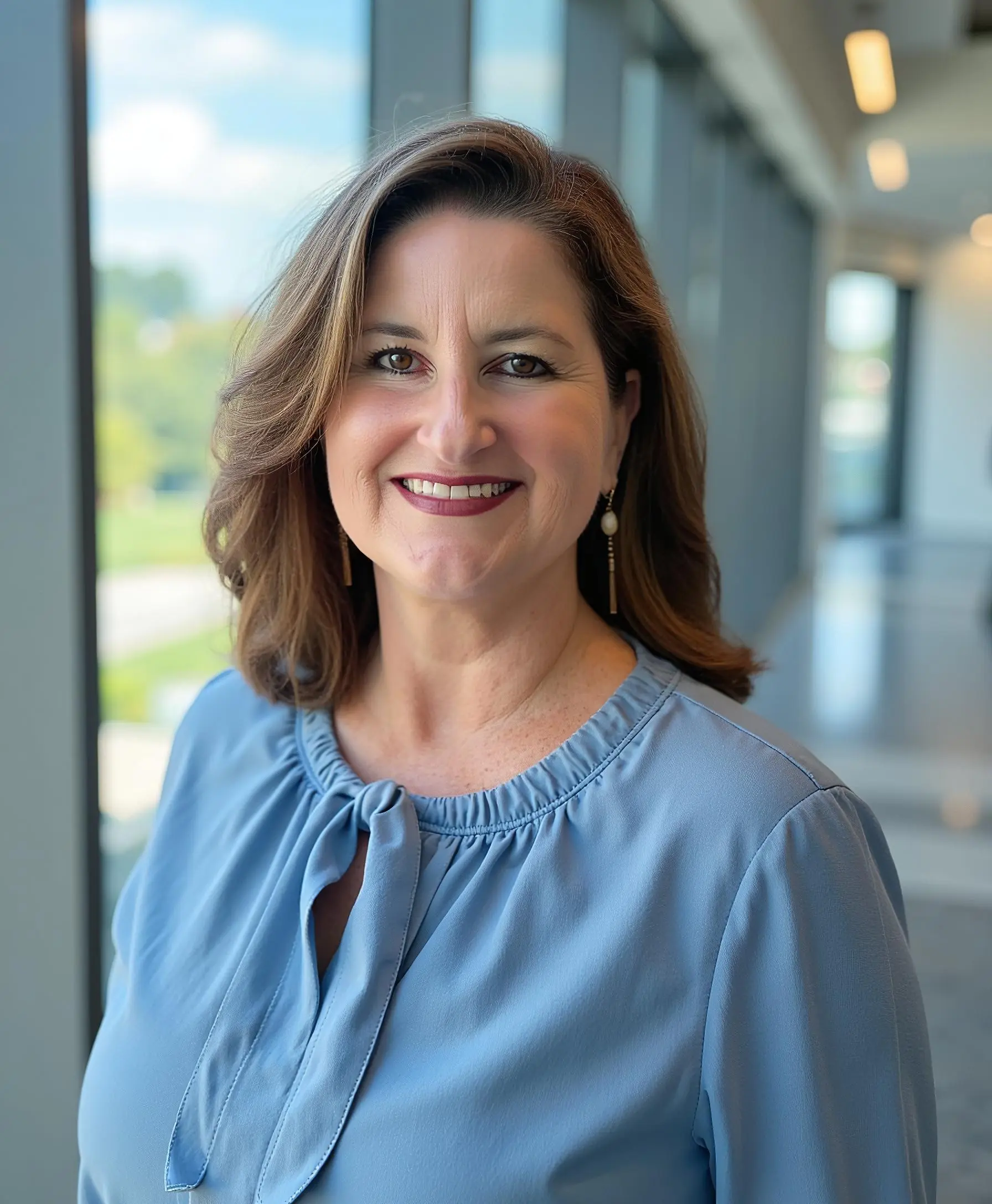 A office portrait of CJ O'Donnell, Director of Client Success at AmbioEdu.